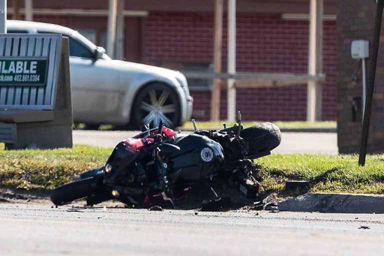 Iowa State Patrol says a woman died in a motorcycle crash in western